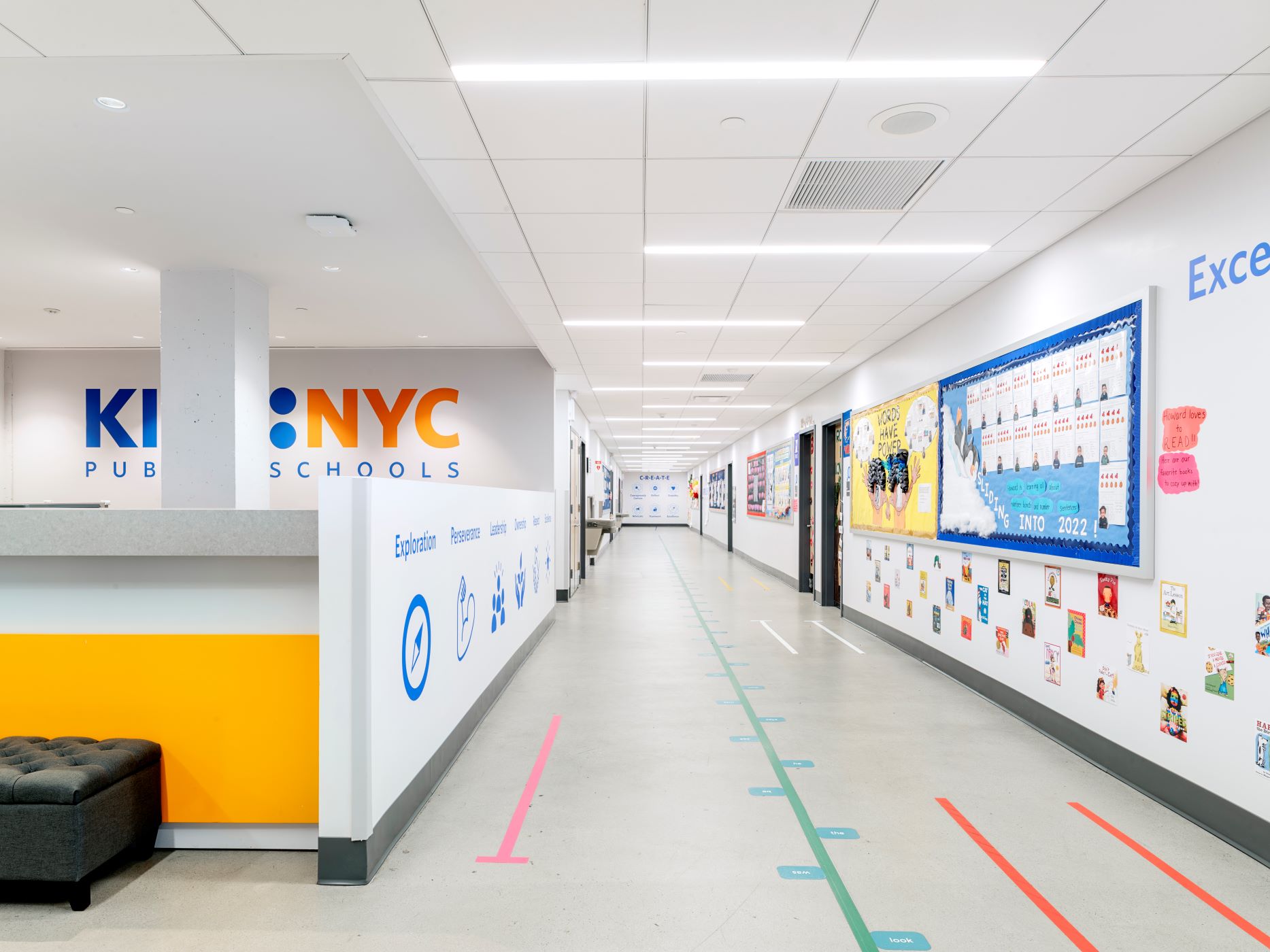 interior of a school with colorful decals on the floor