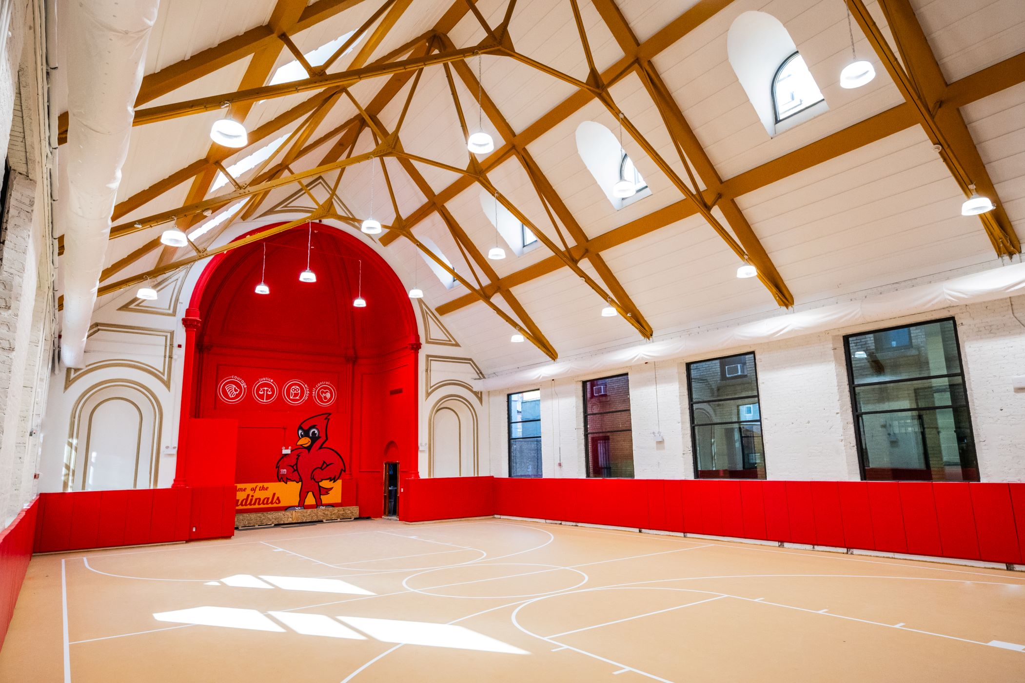 Church converted to gym with red accents