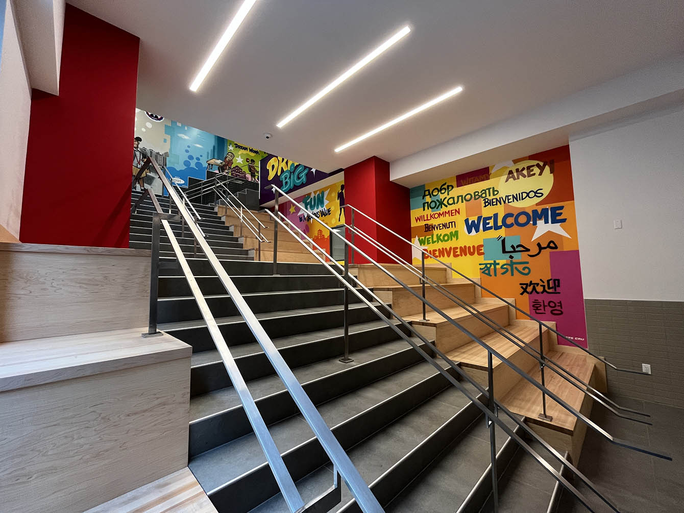 Staircase framed by graffiti mural with the word 