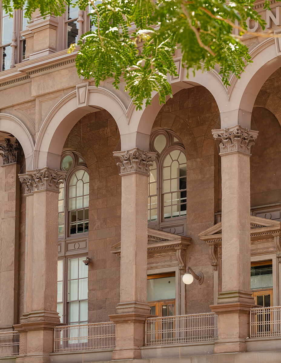 Arched Brownstone Facade of Institutional Building