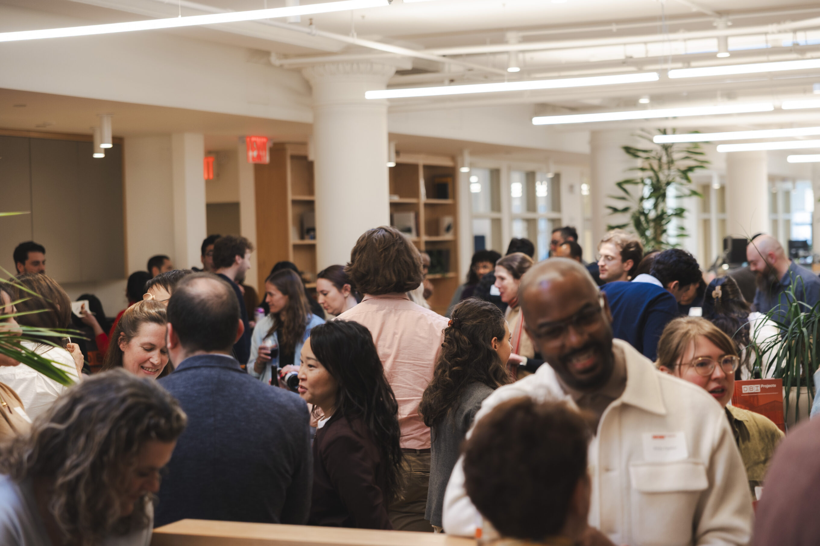 photo of people talking during an office event