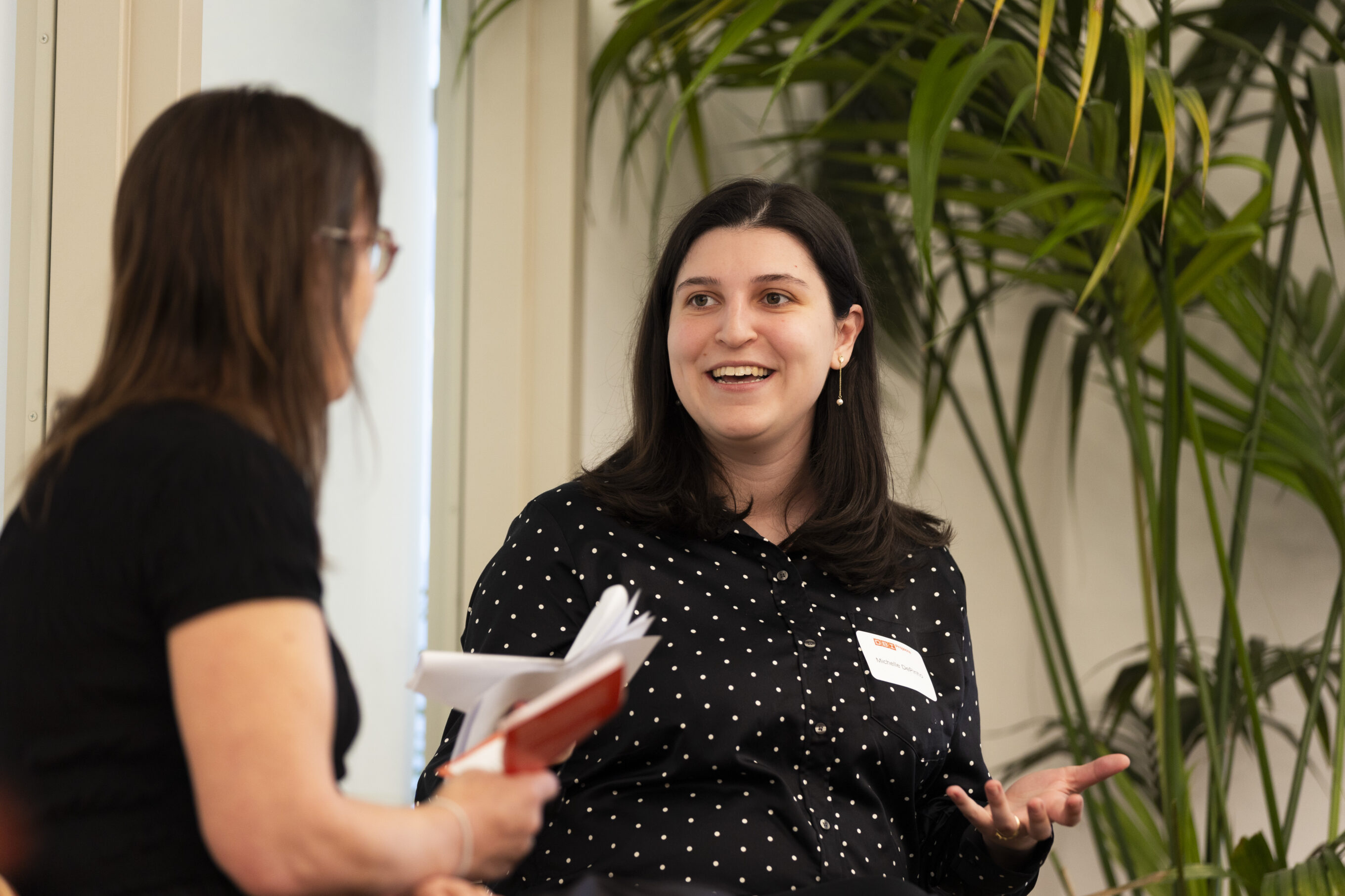 close up photo of two speakers during an office event