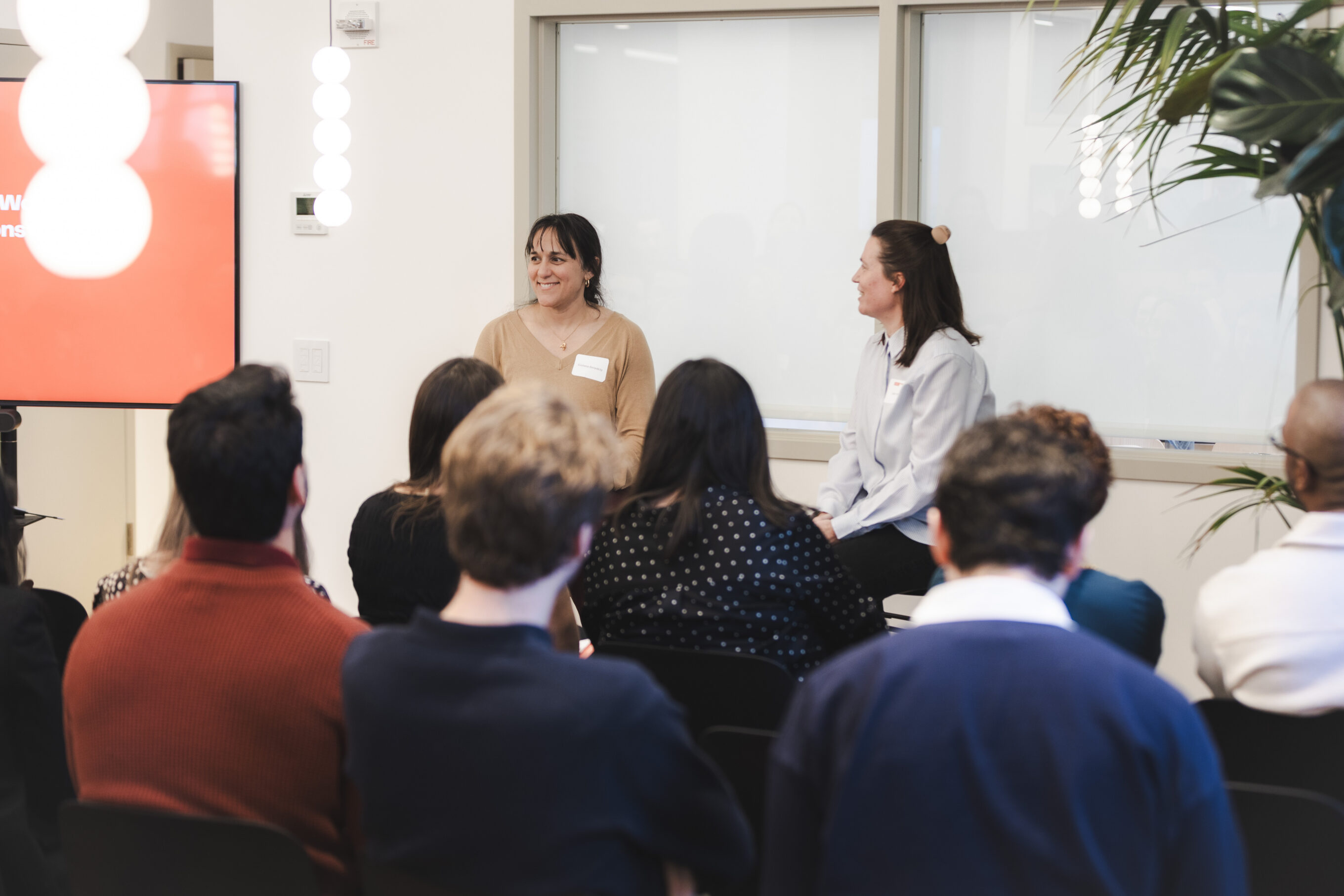 photo of two speakers during an office event